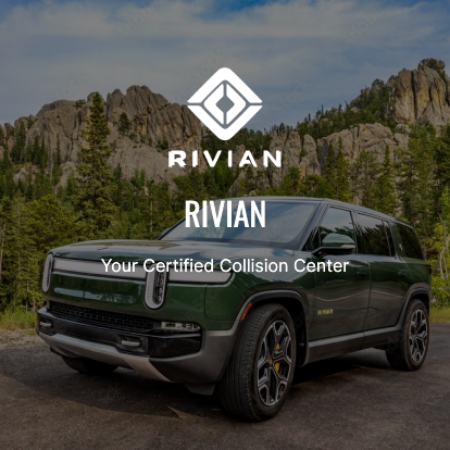 A green rivian truck parked on the side of a road.