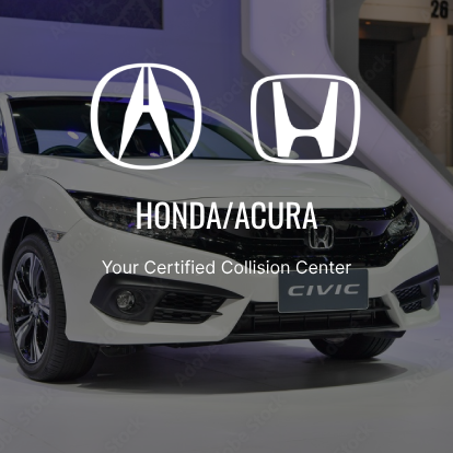 A white car is parked in front of the honda acura logo.