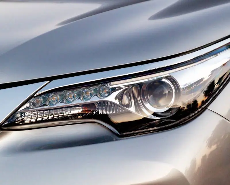 A close up of the headlight on a car